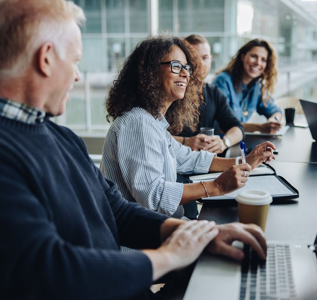 A team of professionals having a productive and engaging meeting in a modern office